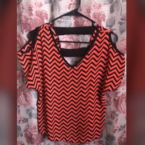 Orange shirt with black stripes